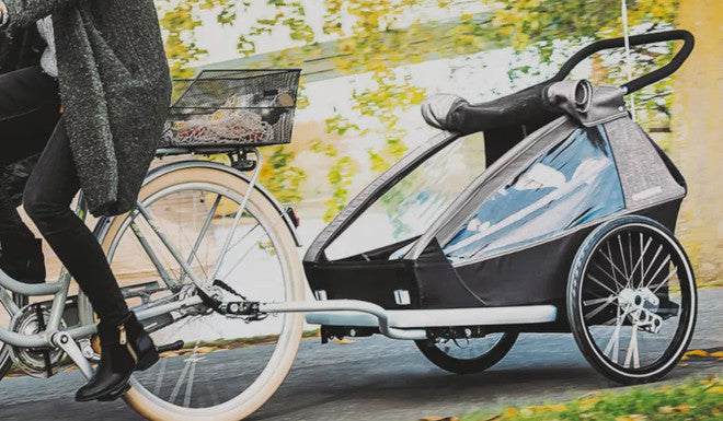 Choisir un siège bébé pour remorque vélo