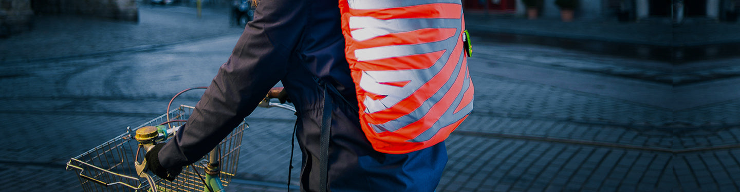 Housse de sac à dos vélo pour être visible en ville