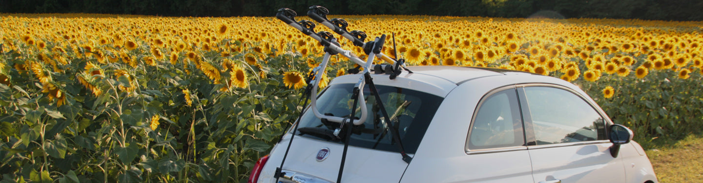 Porte vélos sur coffre de voiture de la marque Peruzzo