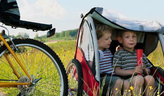 Quelle remorque velo enfant choisir conseil lecyclo
