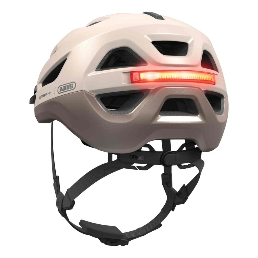 Casque vélo Abus Urban-I 4.0 beige avec lumière LED arrière pour sécurité et visibilité en milieu urbain