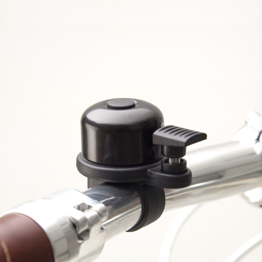Sonnette AirBell Original 22 mm noire avec fixation guidon compatible AirTag pour vélo