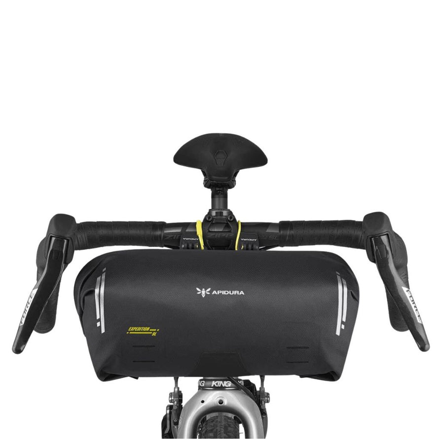 Sacoche de guidon Apidura Expedition compacte et imperméable pour bikepacking et aventures vélo prolongées