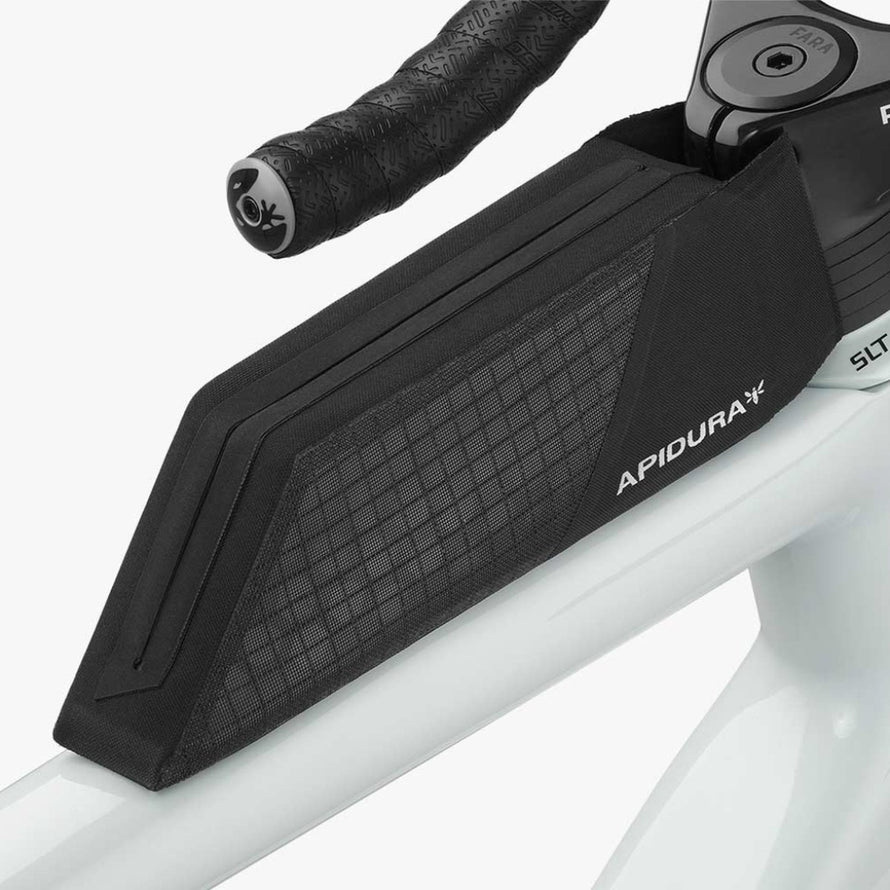Sacoche de tube Apidura Aero Bolt-On noire compacte avec fixation aero pour velo route et rangement optimisé