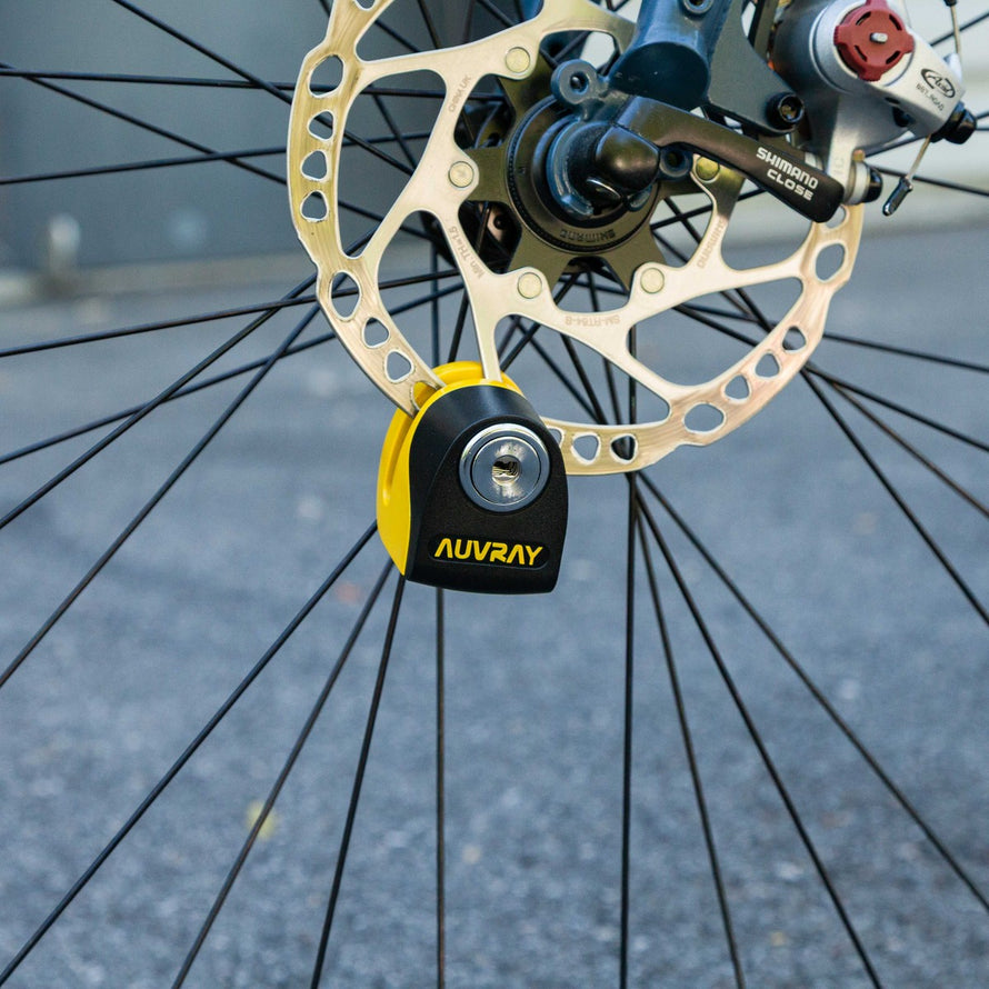 Antivol Auvray B-Lock 06 Mini avec alarme 120 dB pour fixation sécurisée sur disque de frein vélo