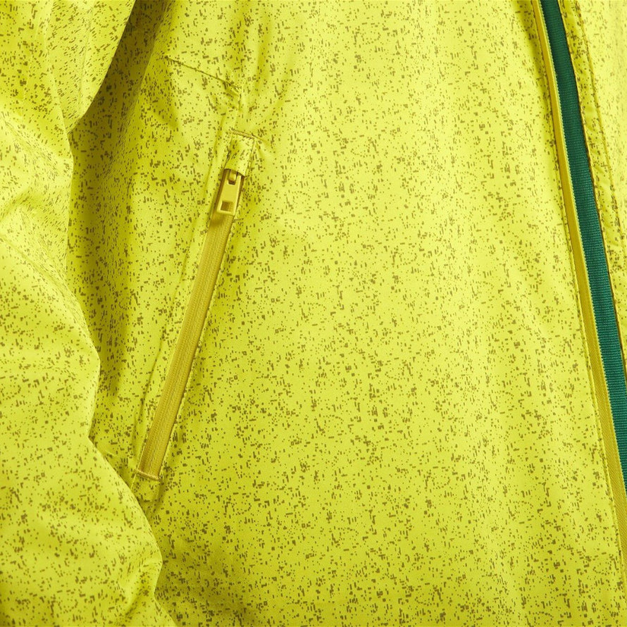 Veste de pluie Basil Skane Hivis femme avec zip imperméable et poches sécurisées pour cyclistes