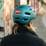 Casque Met E-Mob bleu mat avec feu arriere integre pour velo electrique, securite et confort assures