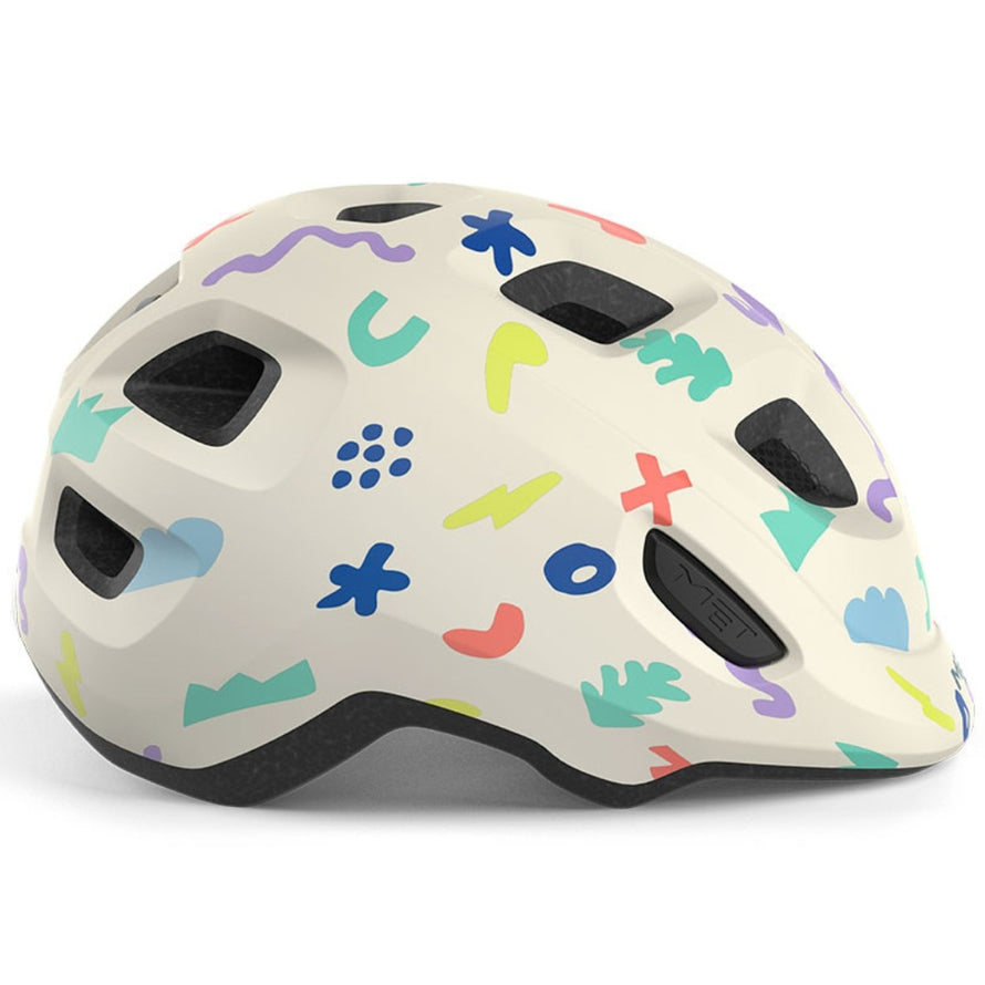 Casque vélo enfant Hourra MET avec motifs pastel, conçu pour siège vélo enfant, alliant sécurité et style