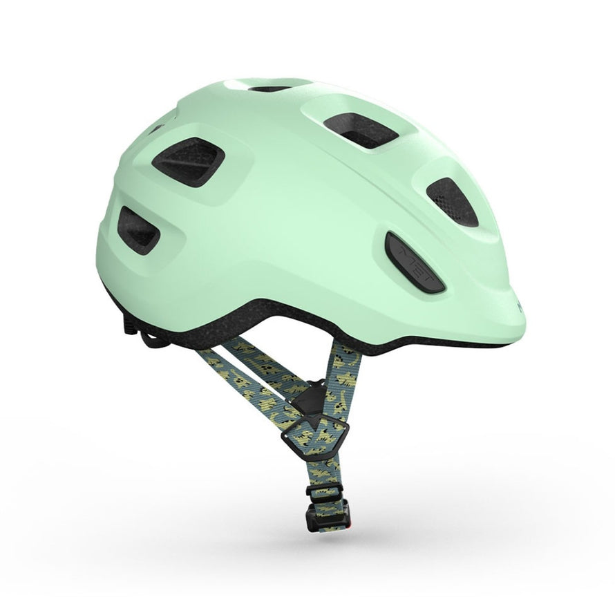 Casque velo enfant Hourra MET vert pastel avec sangle motifs bleu, compatible siege velo enfant pour securite et confort