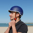 Casque vélo ville Coolride Headlock avec visière et sangle cuir marron pour un style urbain et sécurisé