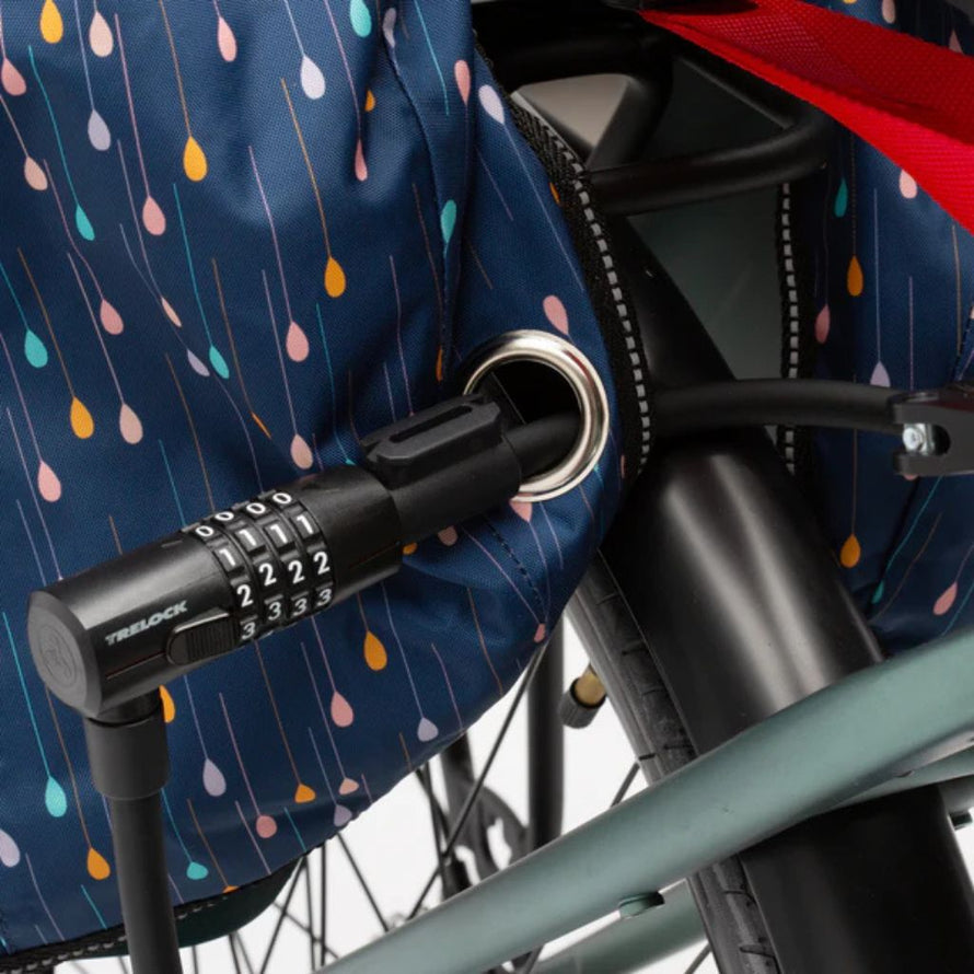 Tissu imperméable Opossum Magic Splash avec motifs gouttes de pluie, protection pluie vélo enfant