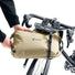 Sacoche de guidon Cabezon 14 Deuter tan, compacte et étanche pour vos aventures bikepacking