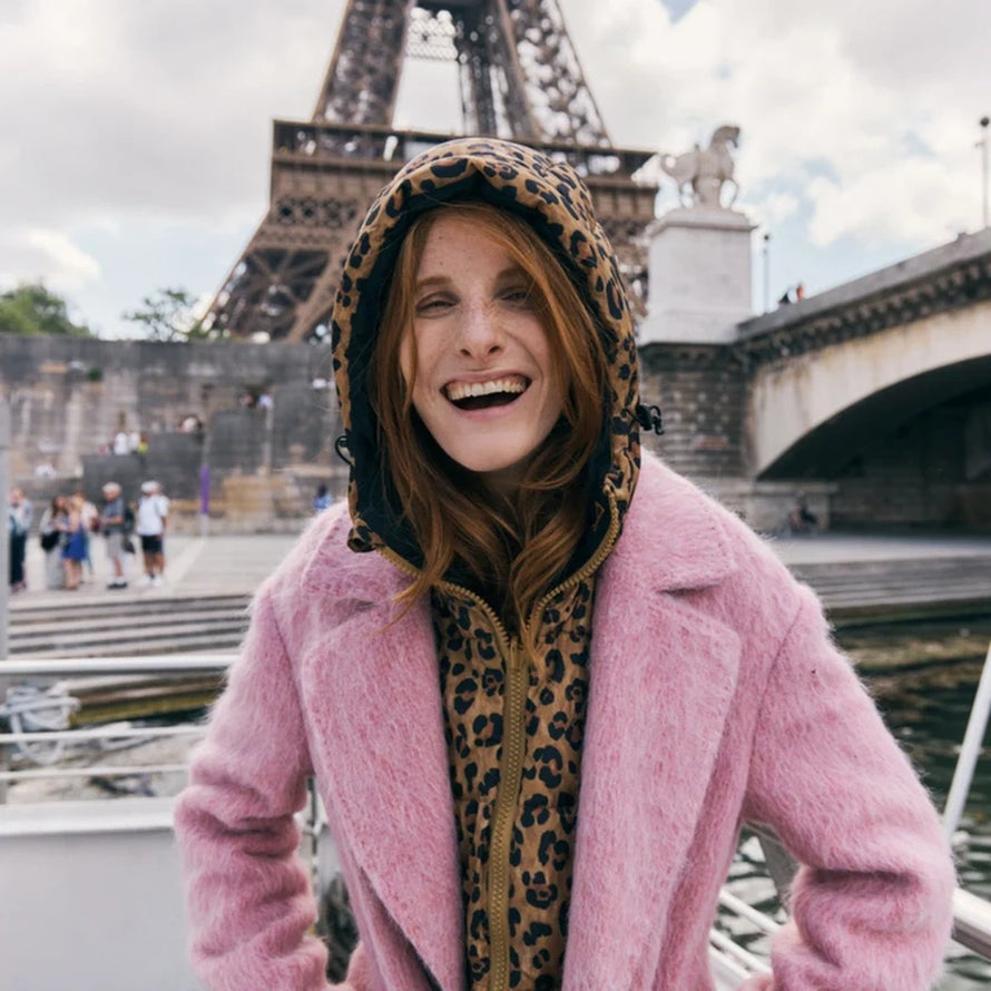 Plastron a capuche doudoune reversible Fudoon modele leopard pour cyclisme urbain et style tendance