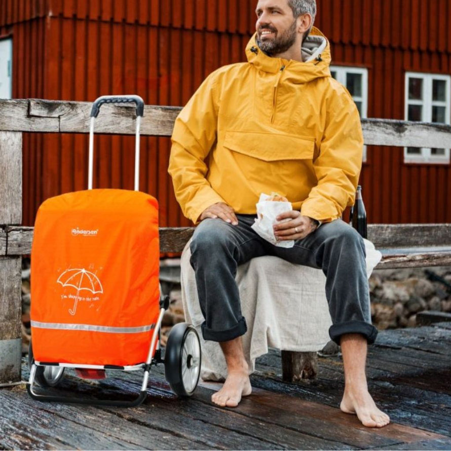 Housse imperméable pour protéger de la pluie votre chariot de courses attelé au porte-bagages vélo
