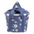 Panier avant vélo Klickfix Bikebasket 15L bleu à fleurs blanches, pratique et élégant pour transport urbain