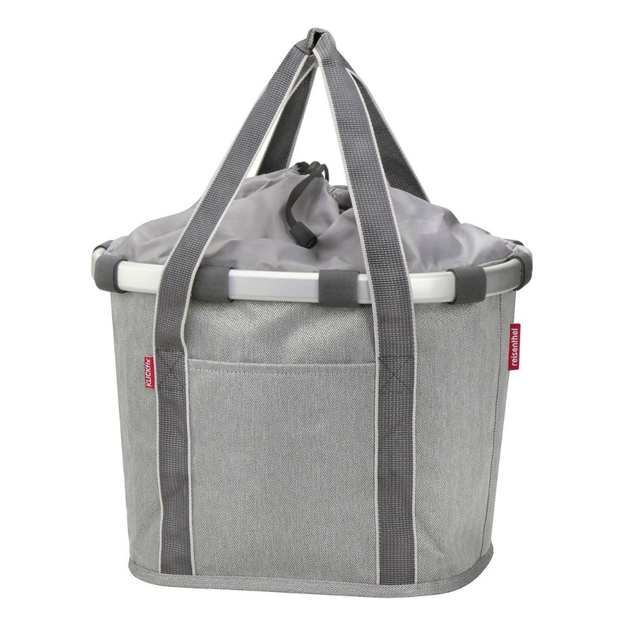Panier avant vélo Klickfix Bikebasket 15L gris clair avec cordon de fermeture, pratique et élégant pour la ville