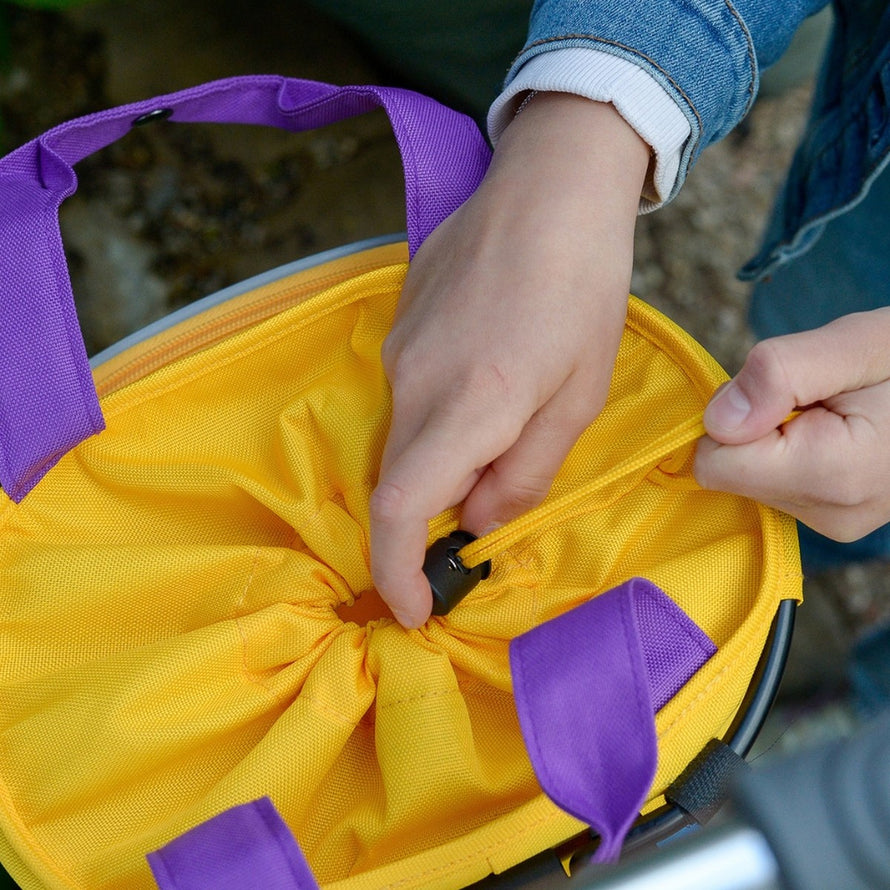Panier vélo enfant Klickfix Lori Shopper 4L jaune et violet avec fixation guidon et cordon de serrage pratique
