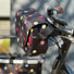 Sacoche guidon Klickfix Reisenthel FunBag 4L noire à pois colorés, légère et convertible pour vélo urbain