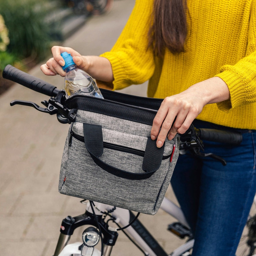 Sacoche guidon vélo Klickfix Roomy 4L gris foncé avec bandoulière, pratique et compacte pour vos sorties à vélo