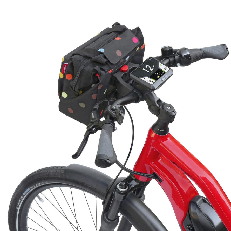 Sacoche guidon Klickfix Roomy 4L noire à pois colorés avec bandoulière, pratique et stylée pour vélo urbain