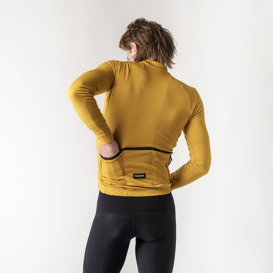 Maillot thermique GripGrab Merinotech Explr jaune moutarde vue dos avec poches pour cyclisme hiver performant