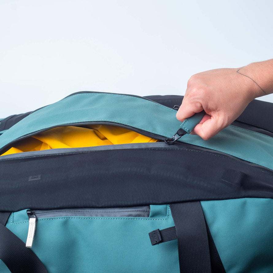 Sac de voyage Duflebag SMÖGEN 80L Meromero avec zip robuste et intérieur jaune pour un rangement optimal