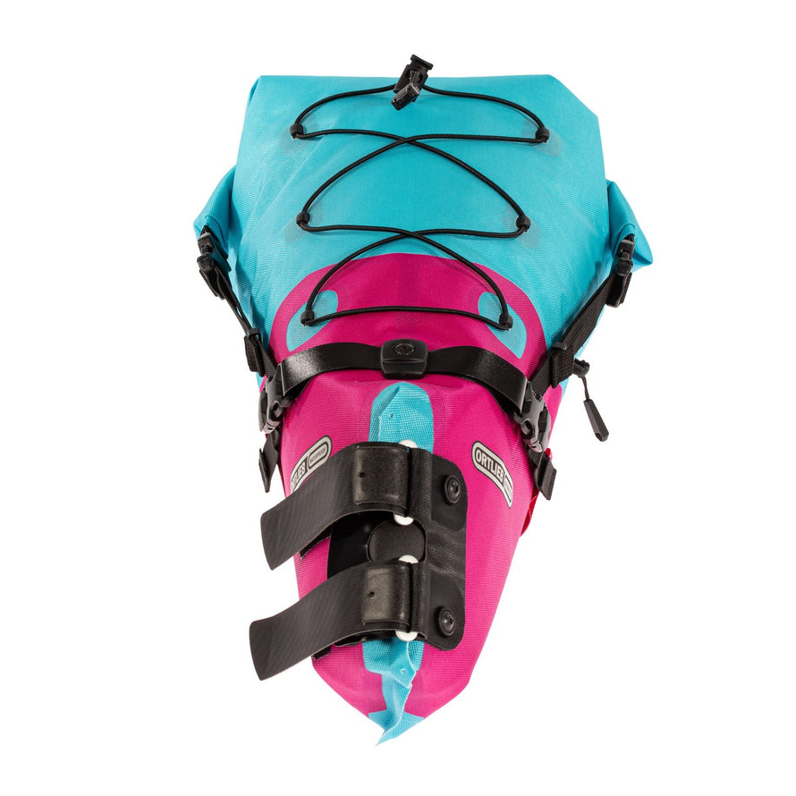 Sacoche de selle Ortlieb Seat-Pack 11-16,5L bleu et rose avec fixation velcro pour bikepacking et voyages vélo