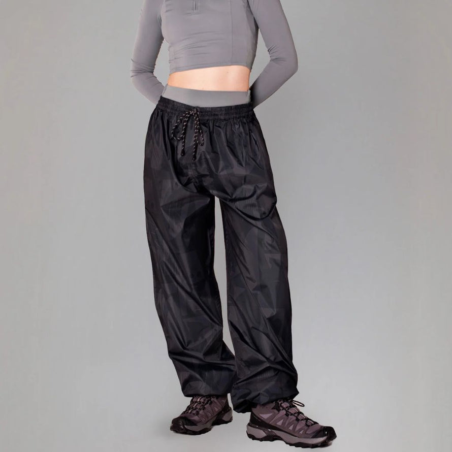 Pantalon de pluie noir Rainkiss Back to Black, confectionné en polyester recyclé
