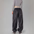 Vue arrière du pantalon imperméable Rainkiss Back to Black, design sobre et raffiné pour un look urbain intemporel à vélo.