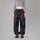 Pantalon de pluie Rainkiss Back to Black pour le vélotaf, confort souple et protection complète contre la pluie pour les trajets quotidiens.