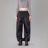 Pantalon de pluie Rainkiss Back to Black pour le vélotaf, confort souple et protection complète contre la pluie pour les trajets quotidiens.