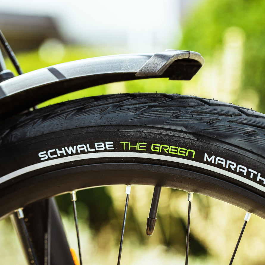 Pneu vélo ville Schwalbe Green Marathon TwinSkin GreenGuard avec marquage distinctif sur le flanc