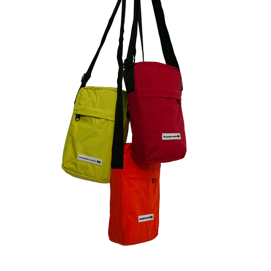 Cape de pluie The Peoples Poncho avec son sac de transport