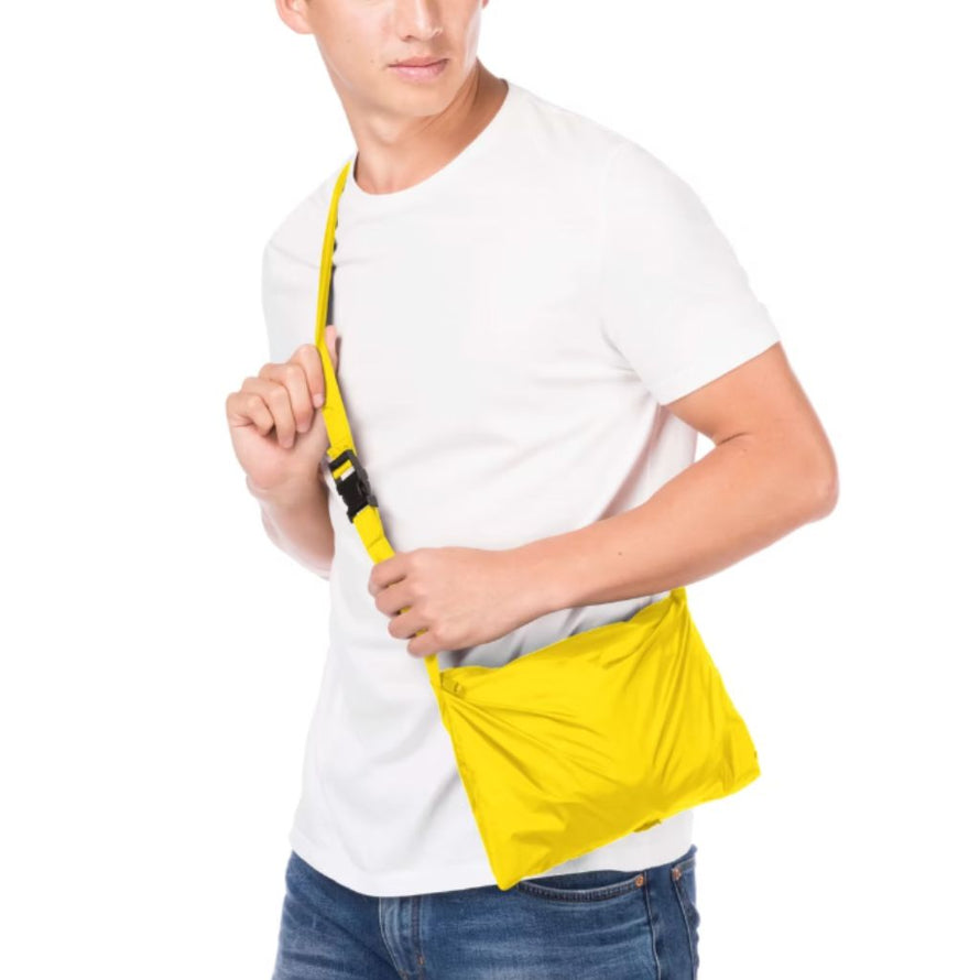 Poncho de pluie pour cyclistes Hock jaune avec pochette de rangement compacte