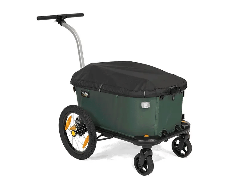 La remorque-chariot Hopper de Burley permet de transporter ses affaires à vélo et à pied, avec une bâche imperméable