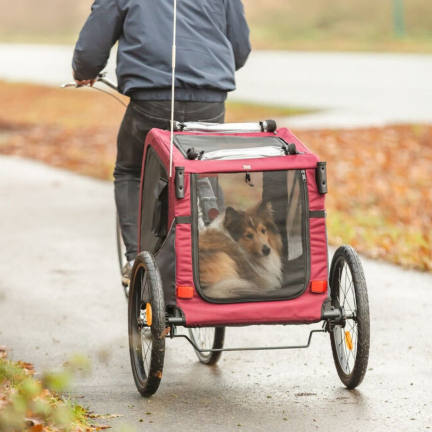 Remorque vélo Trixie 22kg avec grandes roues pour chien, transport sécurisé et confortable en extérieur