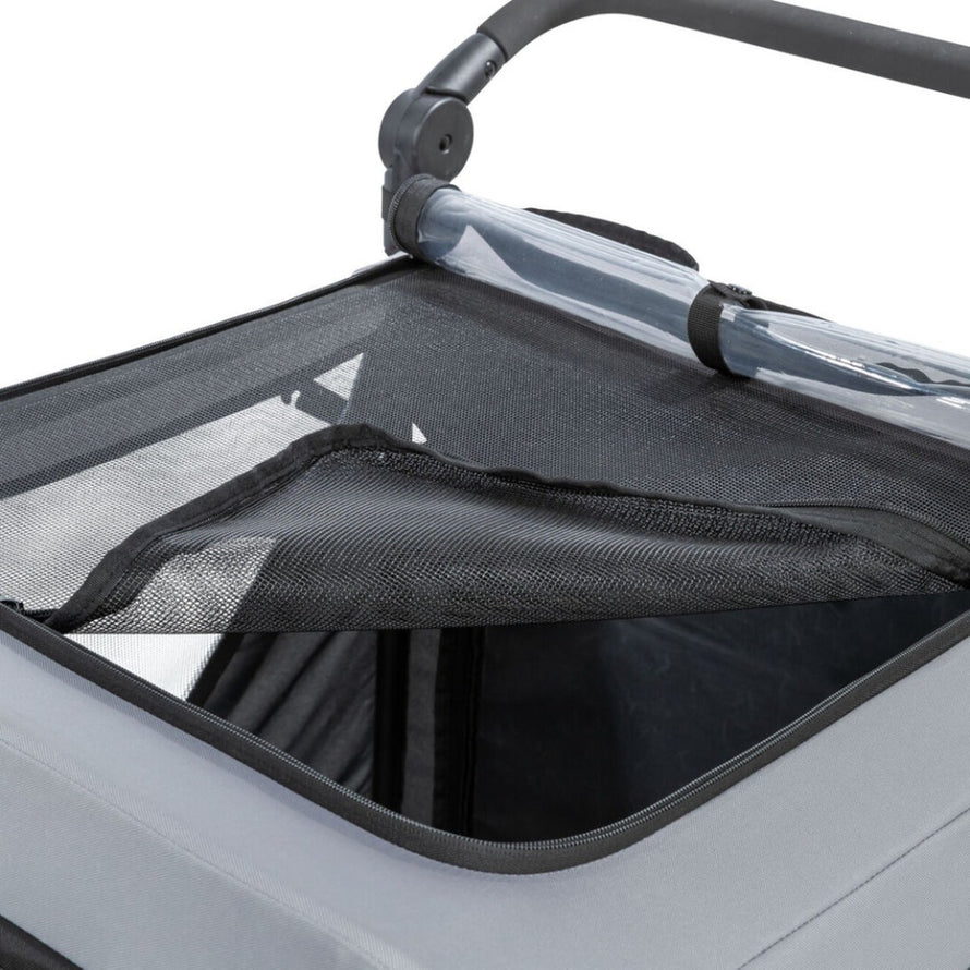 Remorque vélo chien Trixie pliable avec aération en filet, supporte jusqu'à 22 kg, protection optimale pour votre animal
