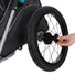 Remorque vélo chien Trixie pliable avec roue détachable, supporte jusqu'à 22 kg, pratique et sécurisée