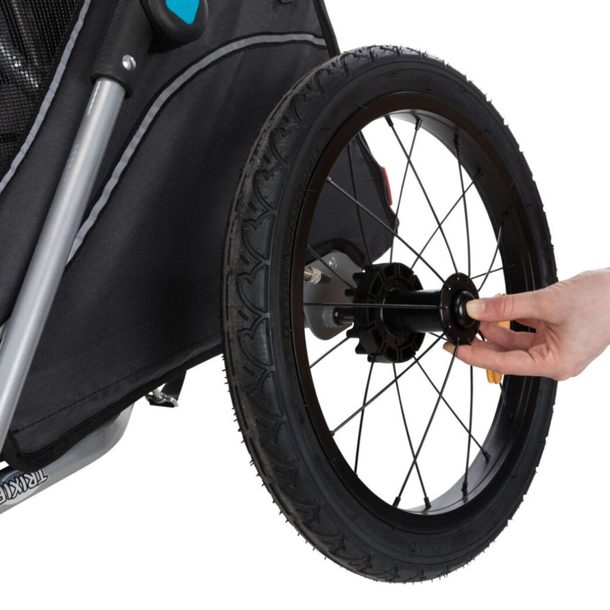 Remorque vélo chien Trixie pliable avec roue détachable, supporte jusqu'à 22 kg, pratique et sécurisée