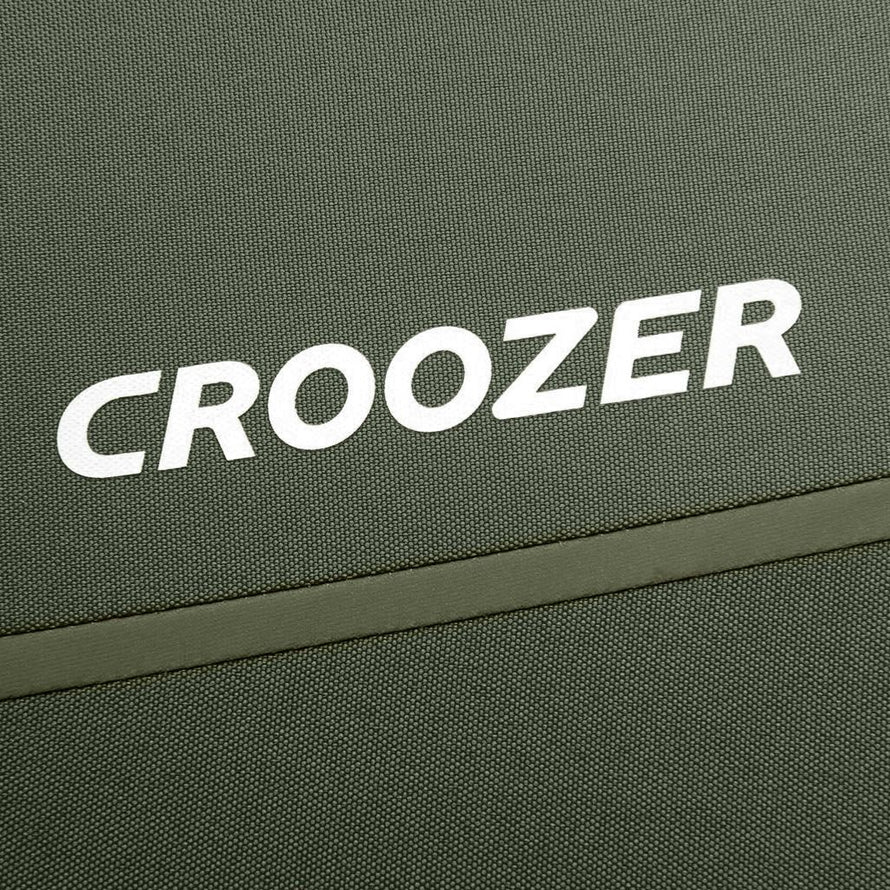 Détail du tissu robuste et du logo Croozer sur la remorque vélo Kalle.
