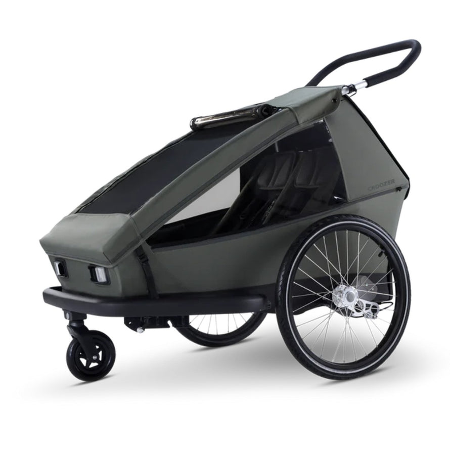 Remorque vélo enfant 2 places Croozer Kid Ellma 2 en olive avec confort et sécurité renforcée pour balades à vélo