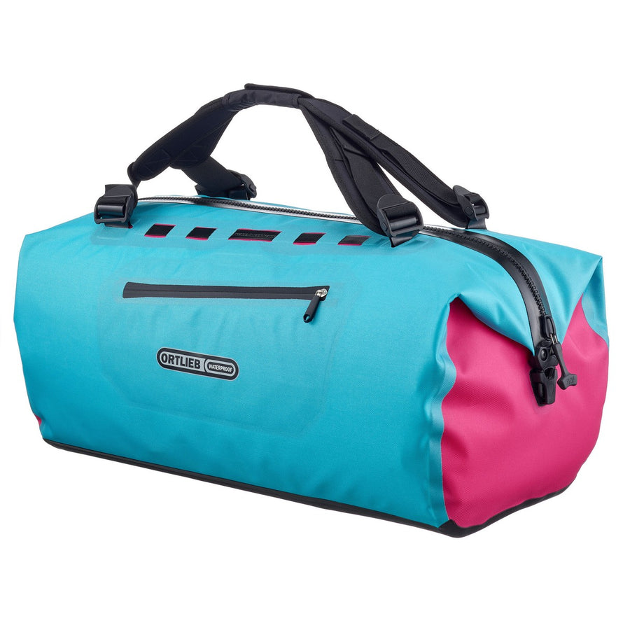 Sac à dos Ortlieb Duffle Lite bleu et rose, étanche et résistant pour voyages à vélo