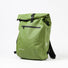 Vue de profil gauche du sac à dos convertible en sacoche vélo Badawin Ali 28 L vert avec logo Badawin visible