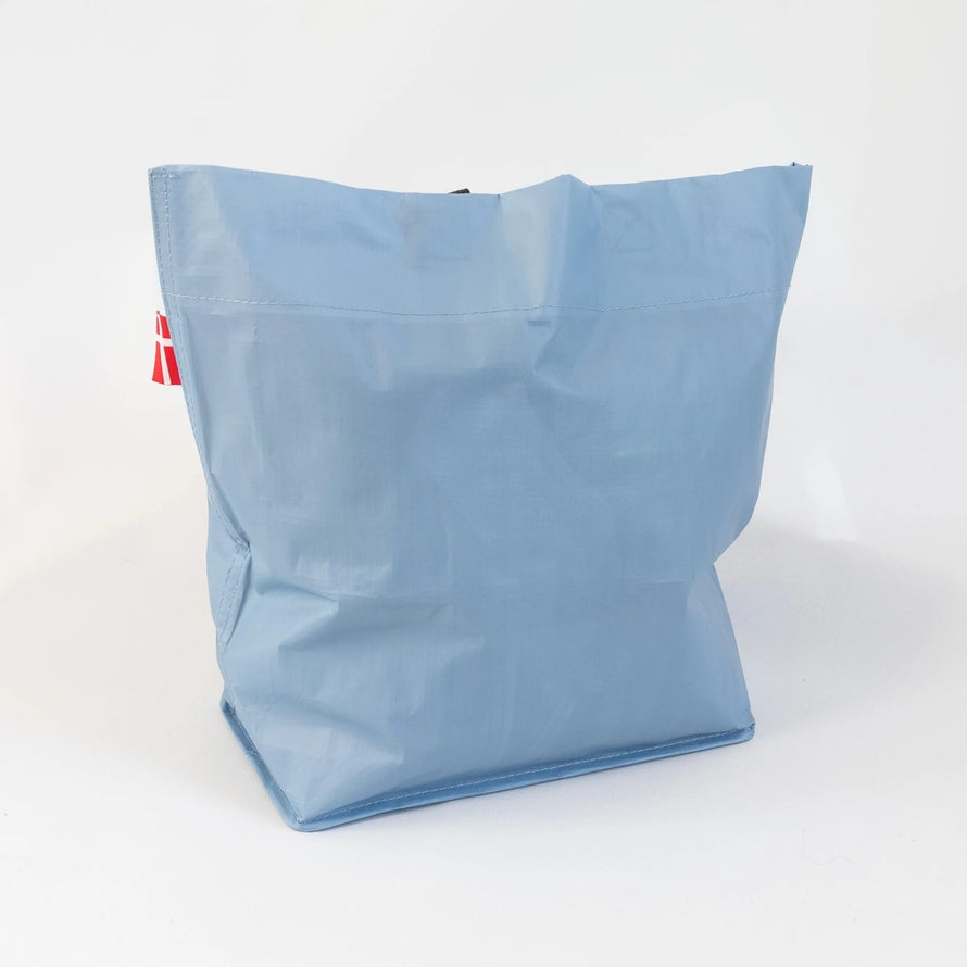 Sac cabas bleu ciel Cobags Bikezac 2.0 20L pour porte-bagages arrière vélo, léger et résistant