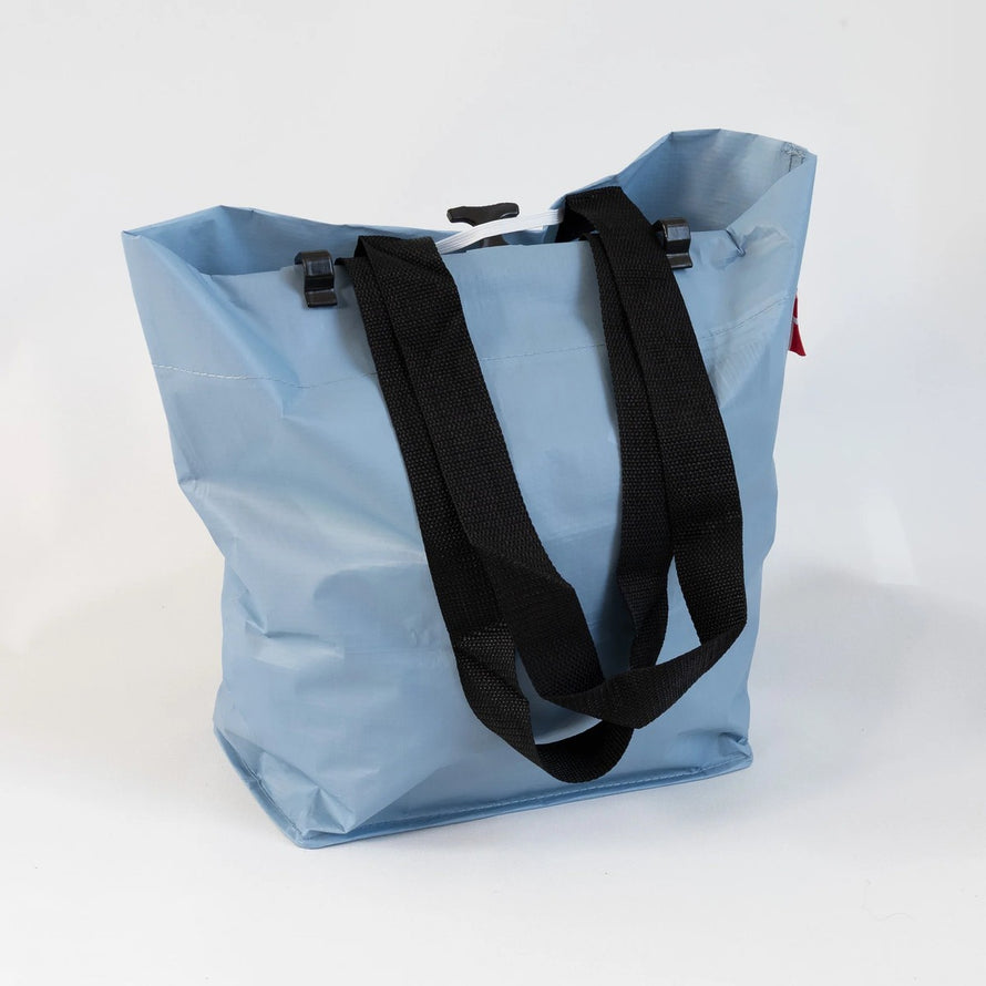 Sac cabas bleu pastel Cobags Bikezac 2.0 20L pour porte-bagages arrière vélo, léger et résistant
