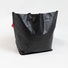 Sac cabas noir brillant Cobags Bikezac 2.0 20L pour porte-bagages arrière vélo, design simple et fonctionnel