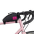 Sacoche top tube Moxie Swift Industries noire avec logo rose fixée sur cadre vélo pour un rangement pratique et stylé