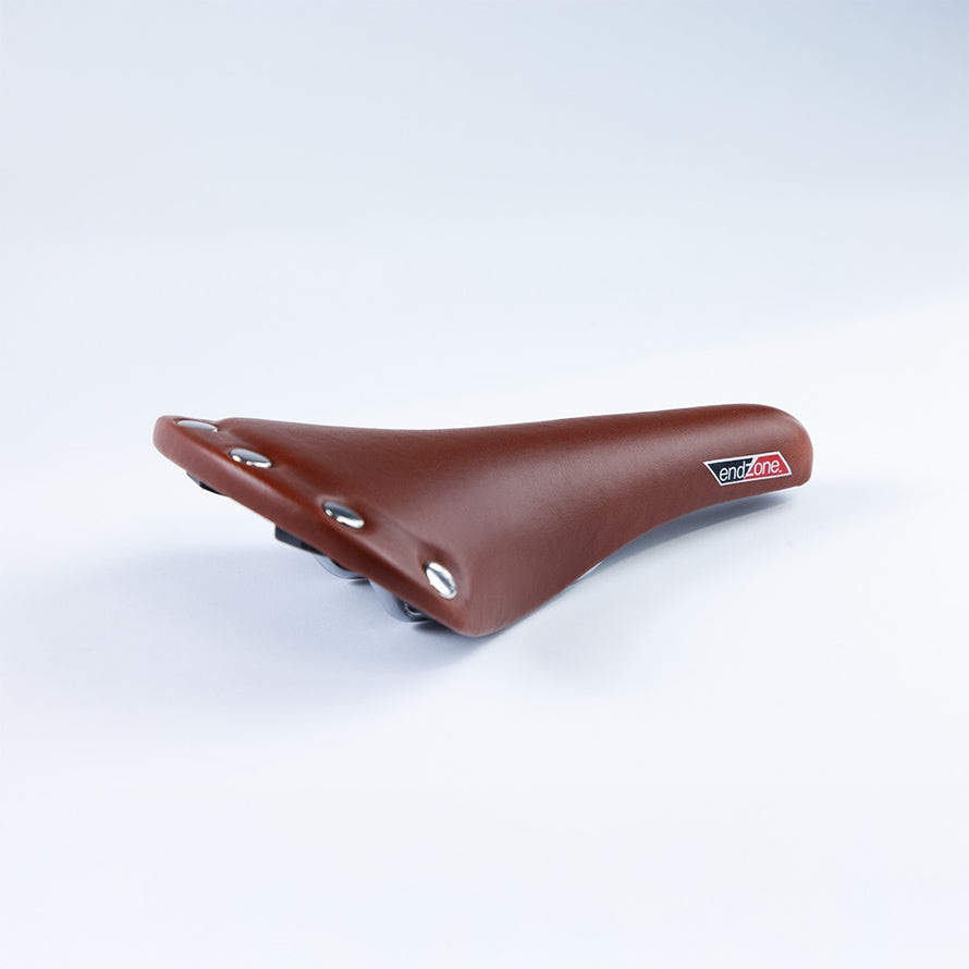 Selle vélo vintage couleur marron imitation cuir détail clous
