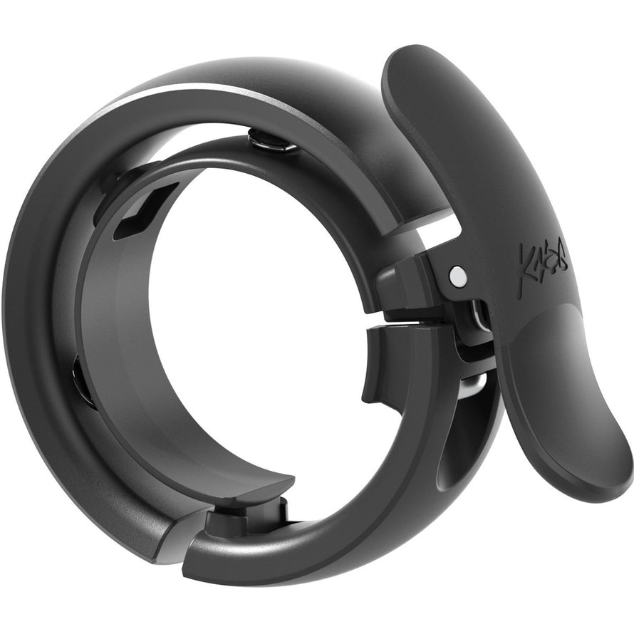 Sonnette vélo Knog Oi Bell Prima Large noire design moderne et compacte pour guidon