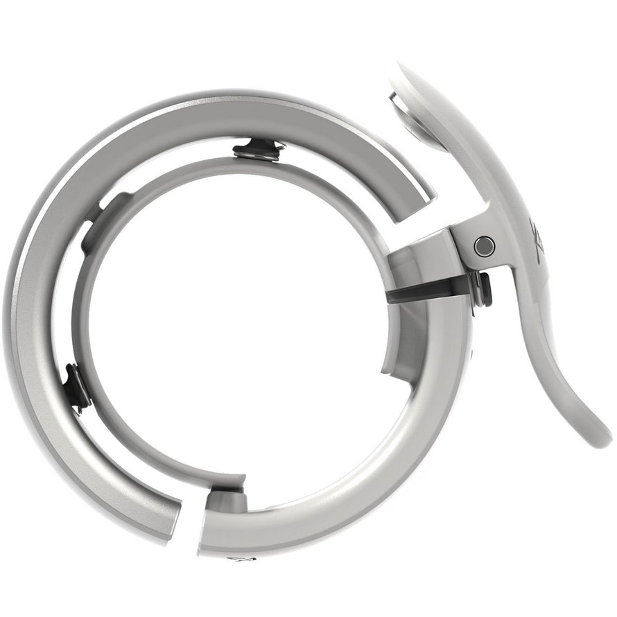 Sonnette vélo Knog Oi Bell Prima Large blanche mate, design compact et installation rapide sur guidon